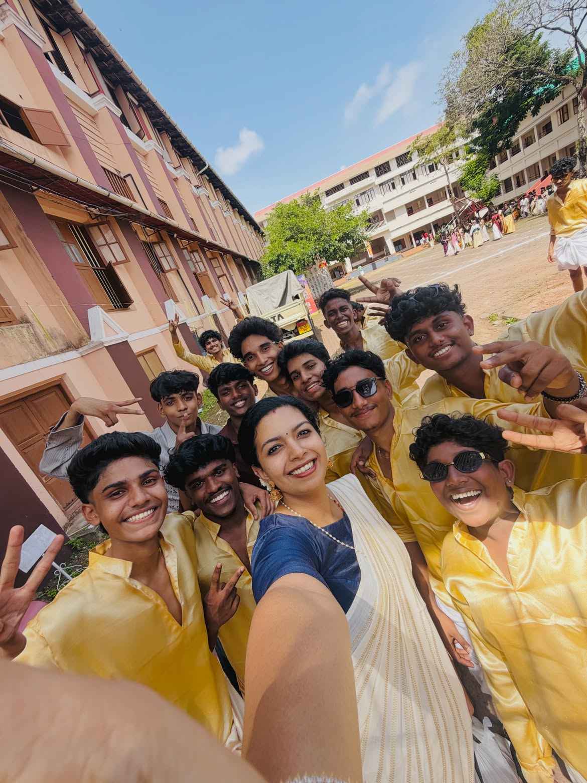 Teacher with students celebration